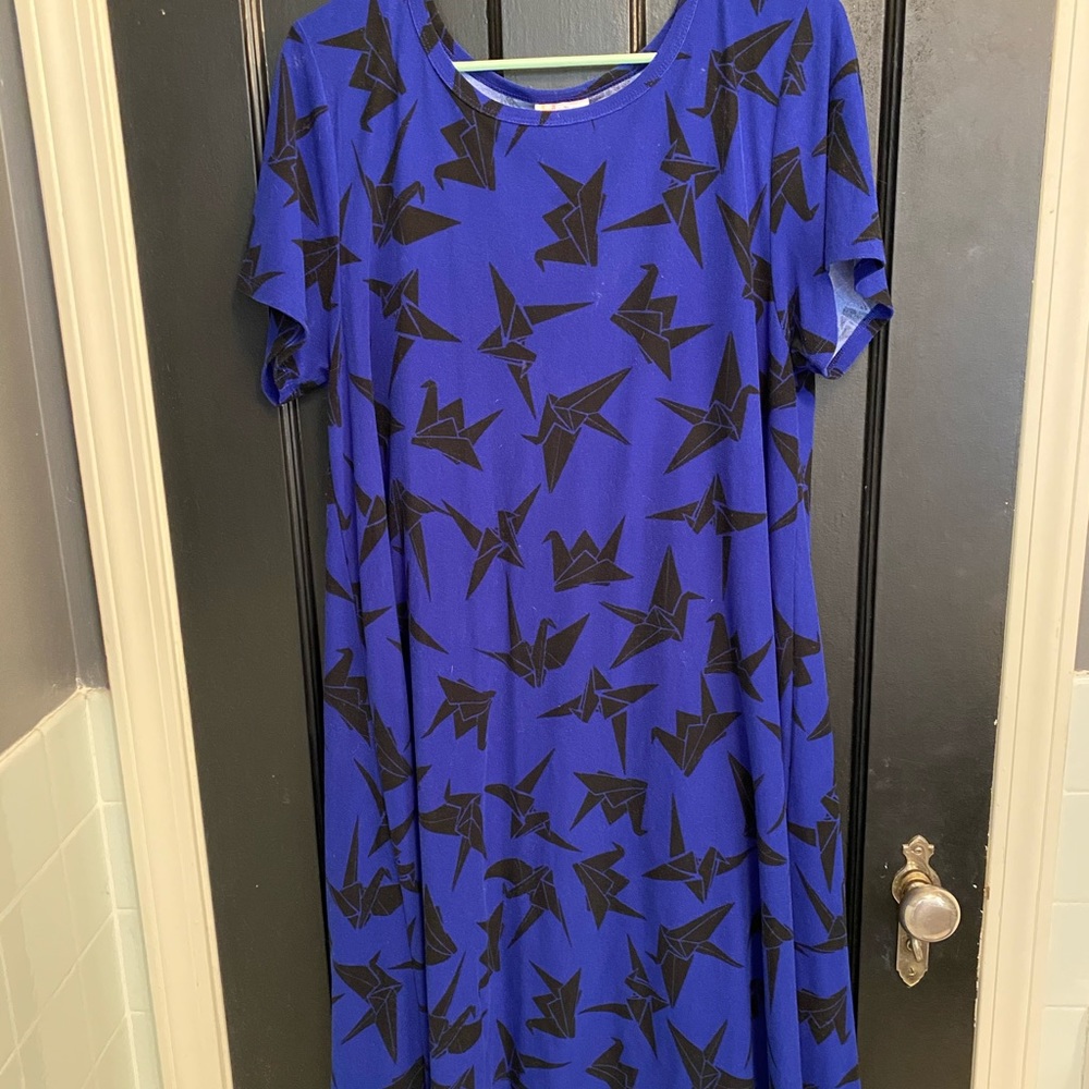 Lularoe Carly - crane pattern legging material. L